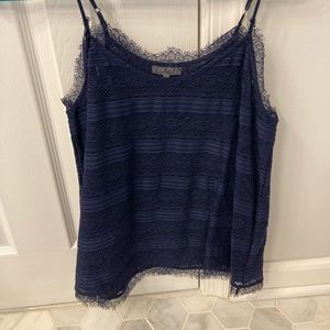 Beautiful navy lace top. One worn, in great condition.